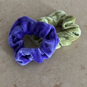 Velvet scrunchies in purple and lime green.